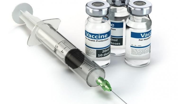 Vaccine in vial with syringe. Vaccination concept.  3d