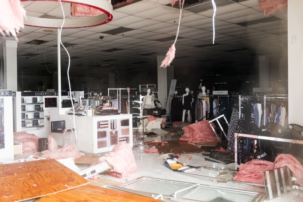 Debris is seen inside of a damaged business after Hurricane Harvey hit Rockport, Texas, U.S., on Saturday, Aug. 26, 2017. As Harvey's winds die down, trouble for Texas has just begun as days of flooding rains across the heart of U.S. energy production threaten the country's fourth-largest city and leave farmers struggling to save horses, cows and crops. Photographer: Alex Scott/Bloomberg via Getty Images
