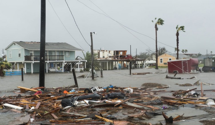 Flooding and debris are seen after Hurricane Harvey hit Rockport, Texas, U.S., on Saturday, Aug. 26, 2017. As Harvey's winds die down, trouble for Texas has just begun as days of flooding rains across the heart of U.S. energy production threaten the country's fourth-largest city and leave farmers struggling to save horses, cows and crops. Photographer: Alex Scott/Bloomberg via Getty Images