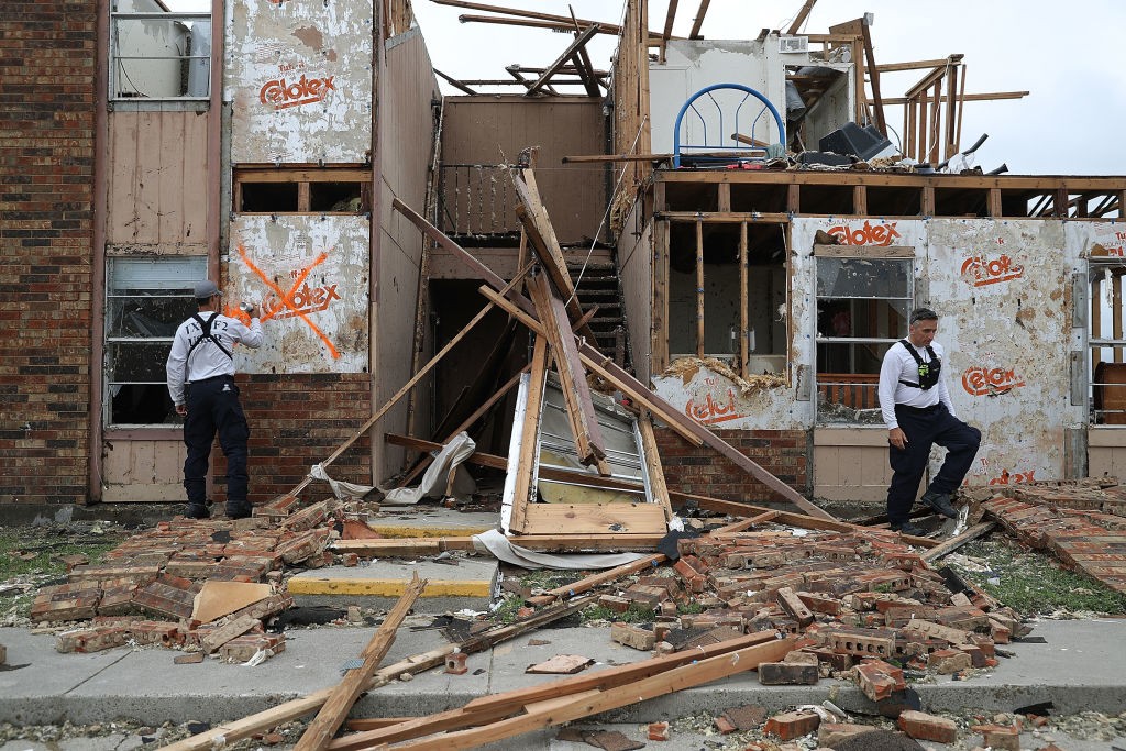 ROCKPORT, TX - AUGUST 26:  Members of the Texas Task Force 2 search and rescue team work through a destroyed apartment complex trying to find anyone that still may be in the apartment complex after Hurricane Harvey passed through on August 27, 2017 in Rockport, Texas. Harvey made landfall shortly after 11 p.m. Friday, just north of Port Aransas as a Category 4 storm and is being reported as the strongest hurricane to hit the United States since Wilma in 2005. Forecasts call for as much as 30 inches of rain to fall in the next few days.  (Photo by Joe Raedle/Getty Images)