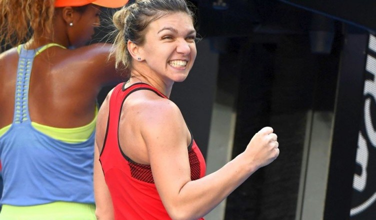 MELBOURNE, AUSTRALIA - JANUARY 22:  Simona Halep of Romania celebrates winning her fourth round match against Naomi Osaka of Japan on day eight of the 2018 Australian Open at Melbourne Park on January 22, 2018 in Melbourne, Australia.  (Photo by Quinn Rooney/Getty Images)