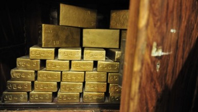 A photo taken on November 29, 2011 shows gold ingots in an antique safe, about 100 years old, shown at the "History of Money" exhibition at the Hungarian National Bank in Budapest. AFP PHOTO / ATTILA KISBENEDEK (Photo by ATTILA KISBENEDEK / AFP)