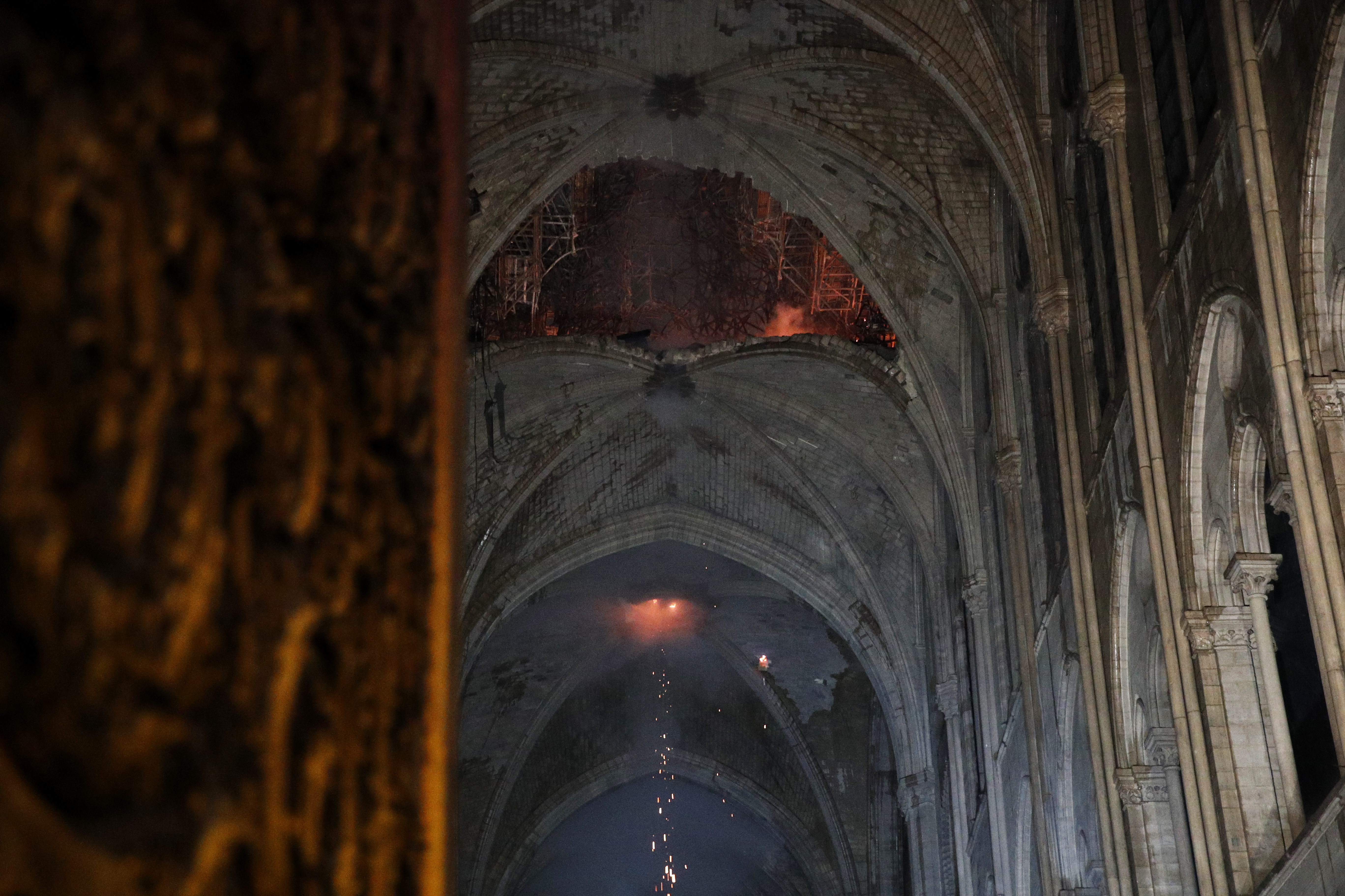 epa07509131 General view of the roof of the Notre-Dame Cathedral after a massive fire in Paris, France, late 15 April 2019. A fire started in the late afternoon in one of the most visited monuments of the French capital.  EPA-EFE/YOAN VALAT