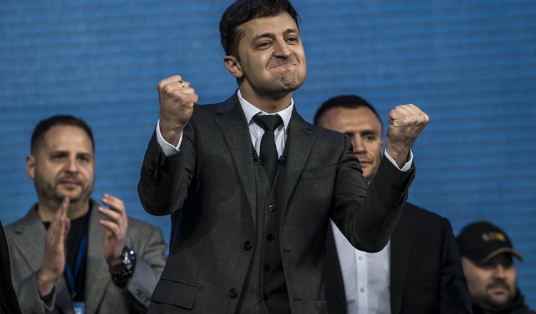 KIEV, UKRAINE - APRIL 19: Ukrainian presidential candidate Volodymyr Zelenskiy (C) reacts after a debate with President Petro O. Poroshenko at Olympiskiy Stadium on April 19, 2019 in Kiev, Ukraine. Recent polls have indicated that Zelenskiy is likely to win Sunday's runoff election by a large margin. (Photo by Brendan Hoffman/Getty Images)