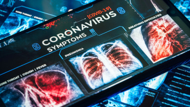 COVID-19 Coronavirus Symptoms. X-ray human body parts infected by COVID-19 virus shot from smart phone screen