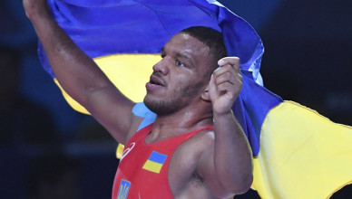 Zhan Beleniuk of Ukraine celebrates his victory over Viktor Lorincz of Hungary in the gold medal match of the men's Greco-Roman 87kg category of the Wrestling World Championships in Nur-Sultan, Kazakhstan, Monday, Sept. 16, 2019. (AP Photo/Anvar Ilyasov)