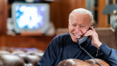 President Joe Biden talks on the phone with service members attending Super Bowl LV watch parties in Kabul and aboard the USS Nimitz Sunday, Feb. 7, 2021, at the Lake House in Wilmington, Delaware. (Official White House Photo by Adam Schultz)