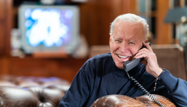 President Joe Biden talks on the phone with service members attending Super Bowl LV watch parties in Kabul and aboard the USS Nimitz Sunday, Feb. 7, 2021, at the Lake House in Wilmington, Delaware. (Official White House Photo by Adam Schultz)