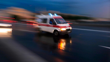 Ambulance car speeding, blurred motion