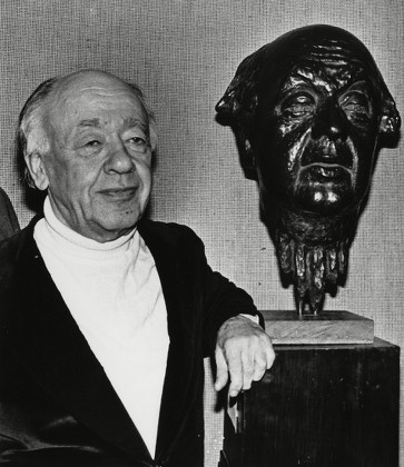 Mandatory Credit: Photo by Margret Pfeil/AP/Shutterstock (7388127a) French-Romanian play writer Eugene Ionesco stands next to a bust of himself created by Rudolf Christian Baisch at the Dumont-Lindemann Museum in Dusseldorf West Germany Eugene Ionesco, DUSSELDORF, Germany