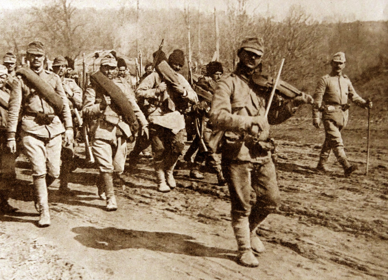 Rumanian soldiers march to war to the company of a violin, World war one 1916,Image: 214245191, License: Rights-managed, Restrictions: , Model Release: no