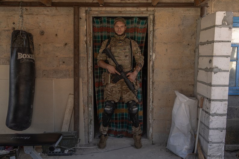 TOPSHOT - A Ukrainian soldier callsign "Storm", 27, of assault battalion Skala poses for a portrait, in an undisclosed location near the town of Orikhiv, in the Zaporizhzhia region, on October 1, 2023, amid the Russian invasion of Ukraine. (Photo by Roman PILIPEY / AFP) (Photo by ROMAN PILIPEY/AFP via Getty Images)