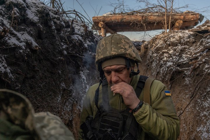 TOPSHOT - A Ukrainian soldier of the 41st brigade walks in a trench near the frontline, outside Kupiansk, Kharkiv region, on January 23, 2024, amid the Russian invasion of Ukraine. (Photo by Roman PILIPEY / AFP) (Photo by ROMAN PILIPEY/AFP via Getty Images)