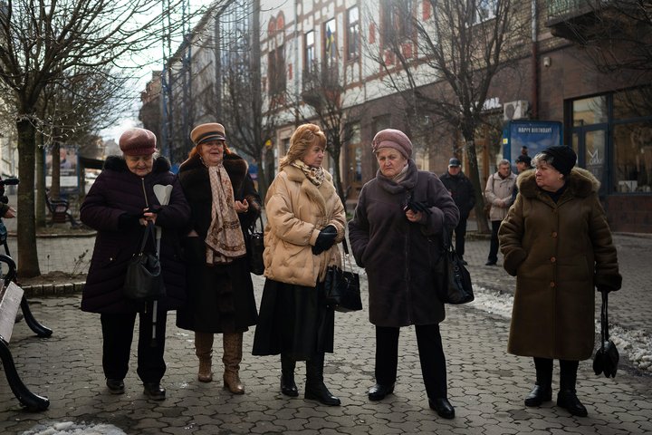 Members of Ukraine's ethnic Hungarian minority leave after attending mass at a Catholic church in Uzhhorod, Sunday, Jan. 28, 2024. Ukraine amended its laws to comply with EU membership requirements, and restored many of the language rights for minorities demanded by Budapest but Hungary's government has indicated it is not fully satisfied — a potentially explosive sticking point as EU leaders meet Thursday, Feb. 1, 2024 to try and break Orban's veto of a major aid package earmarked for Kyiv. (AP Photo/Denes Erdos)