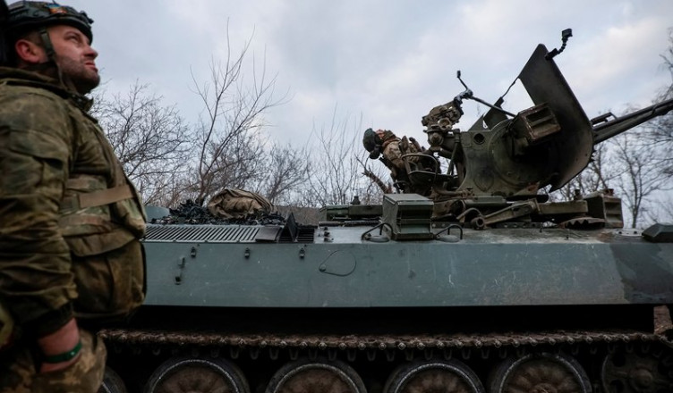 Ukrainian servicemen from air defence unit of the 93rd Mechanized Brigade monitor a sky at a frontline, amid Russia's attack on Ukraine, near the town of Bakhmut, Ukraine March 6, 2024. Radio Free Europe/Radio Liberty/Serhii Nuzhnenko via REUTERS