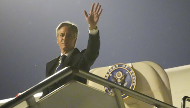 U.S. Secretary of State Antony Blinken waves as he prepares to return to the U.S. following a visit to China, Friday, April 26, 2024, at Beijing Capital International Airport in Beijing, China. (AP Photo/Mark Schiefelbein, Pool)