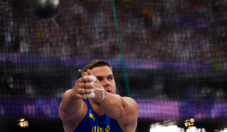 Paris 2024 Olympics - Athletics - Men's Hammer Throw Final - Stade de France, Saint-Denis, France - August 04, 2024. Mykhaylo Kokhan of Ukraine in action. REUTERS/Aleksandra Szmigiel