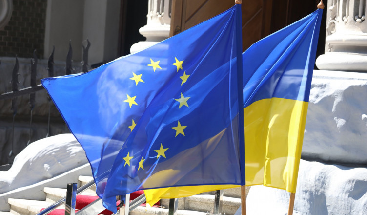 KYIV, UKRAINE – MAY 9: Flags of Ukraine and the European Union fly near a government building on May 9, 2024 in Kyiv, Ukraine. On Europe Day, the President of the European Parliament, Roberta Metzola, arrived in Ukraine with an unannounced visit. Roberta Metzola was one of the first high-ranking politicians to visit Kyiv after the large-scale invasion of Russia - her first visit she made on April 1, 2022. During today's meeting with the President of Ukraine, they discussed the situation at the front, defense support, Ukraine's European integration, and the Global Peace Summit. (Photo by Viktor Kovalchuk/Global Images Ukraine via Getty Images)