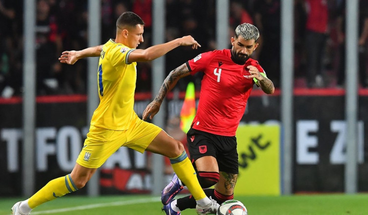 Albania's defender #04 Elseid Hysaj (R) and Ukraine's midfielder #21 Vladyslav Kabaiev vie for the ball during the League B Group B1 football match of the UEFA Nations League between Ukraine and Albania in Prague, Czech Republic, on September 7, 2024. (Photo by Michal Cizek / AFP) (Photo by MICHAL CIZEK/AFP via Getty Images)