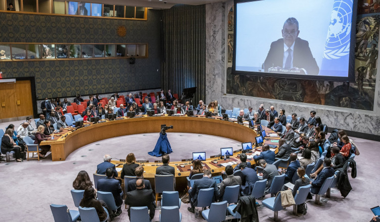 Philippe Lazzarini, Commissioner-General of the United Nations Relief and Works Agency for Palestine Refugees in the Near East is seen on a screen as he speaks to members of the U.N. Security Council at United Nations headquarters Monday, Oct. 30, 2023. (AP Photo/Eduardo Munoz Alvarez)