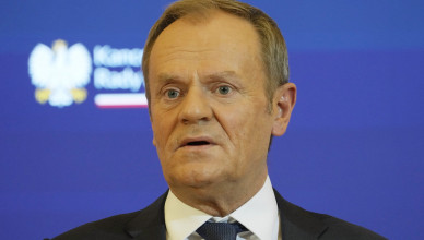 Poland's new Prime Minister Donald Tusk tells during a news conference that his pro-European Union government is urgently preparing a new spending bill to secure raises for teachers and re-dedicate some 3 billion zlotys ($762 million), originally meant for state media, to children's health, after President Andrzej Duda, allied with the opposition party, vetoed the previous bill that earmarked funds for state media, in Warsaw, Poland, Wednesday Dec. 27, 2023. (AP Photo/Czarek Sokolowski)