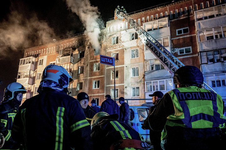 Firefighters work at the site of an apartment building hit by a Russian drone strike, amid Russia's attack on Ukraine, in Ternopil, Ukraine December 2, 2024. Press service of the State Emergency Service of Ukraine in Ternopil region/Handout via REUTERS ATTENTION EDITORS - THIS IMAGE HAS BEEN SUPPLIED BY A THIRD PARTY.